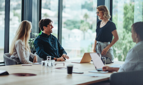 Group of happy corporate people in a meeting